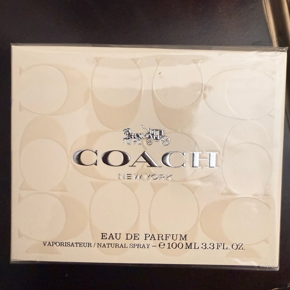 Coach Fragrance Packaging with Cream and Black Accents
